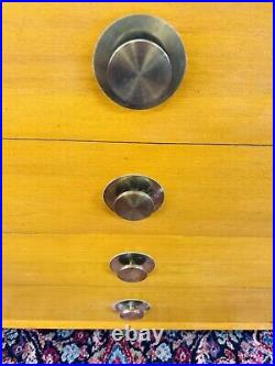 Rare Mid Century Modern Four Drawer Dresser with Iconic Round Brass Drawer Pulls Rare Mid Century Modern Four Drawer Dresser with Iconic Round Brass Drawer Pulls